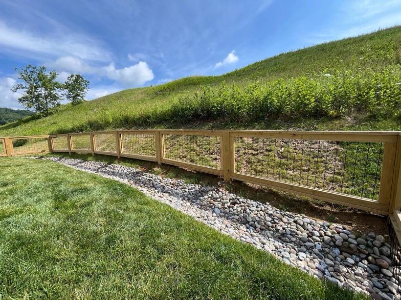 Board Fence with Wire built by Mountain Fence & Deck in Western North Carolina