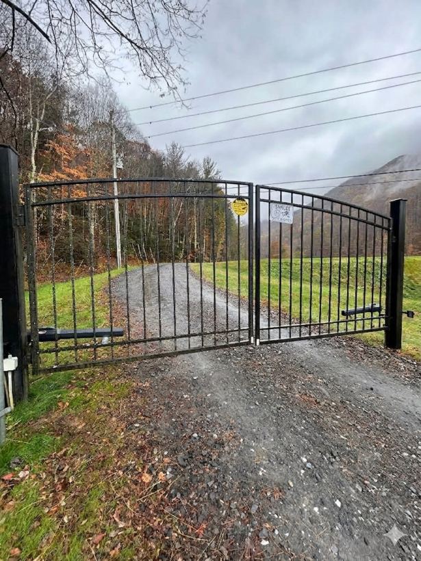 Custom Gate by Mountain Fence and Deck